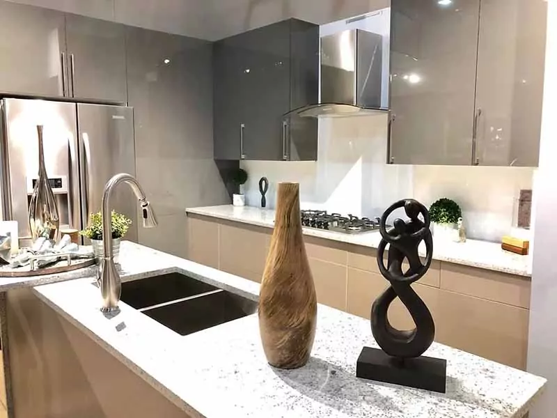 Vases and sculpture on kitchen countertops