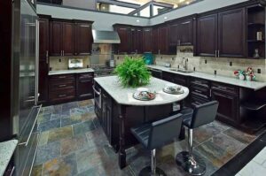 Kitchen with dark brown cabinets and large island