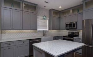 Modern kitchen with gray cabinets and cupboards