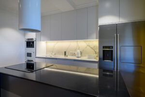 custom kitchen with sleek cabinets
